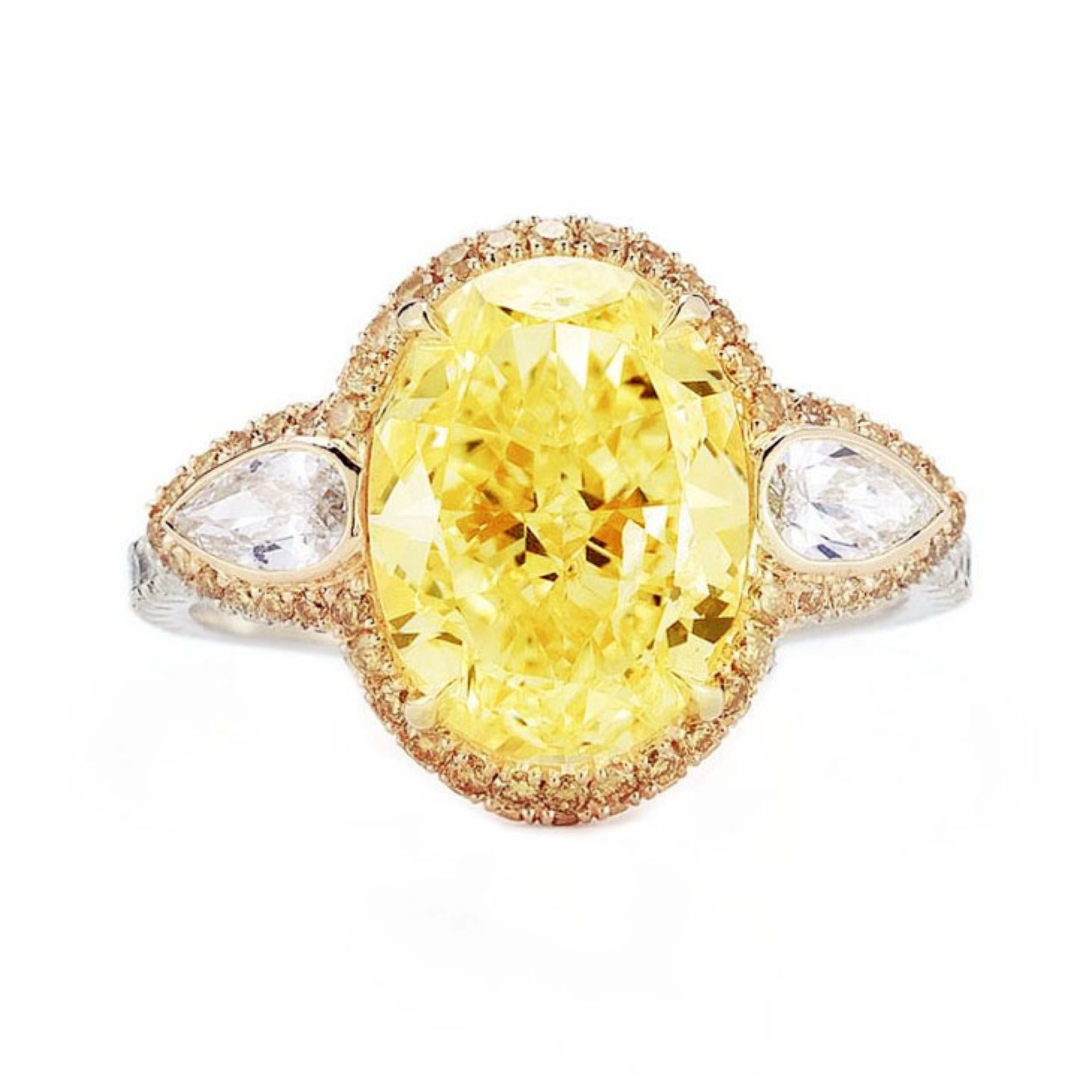 Fancy Intense Yellow Oval Trilogy — 4.20 ct